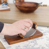 Garlic press with base